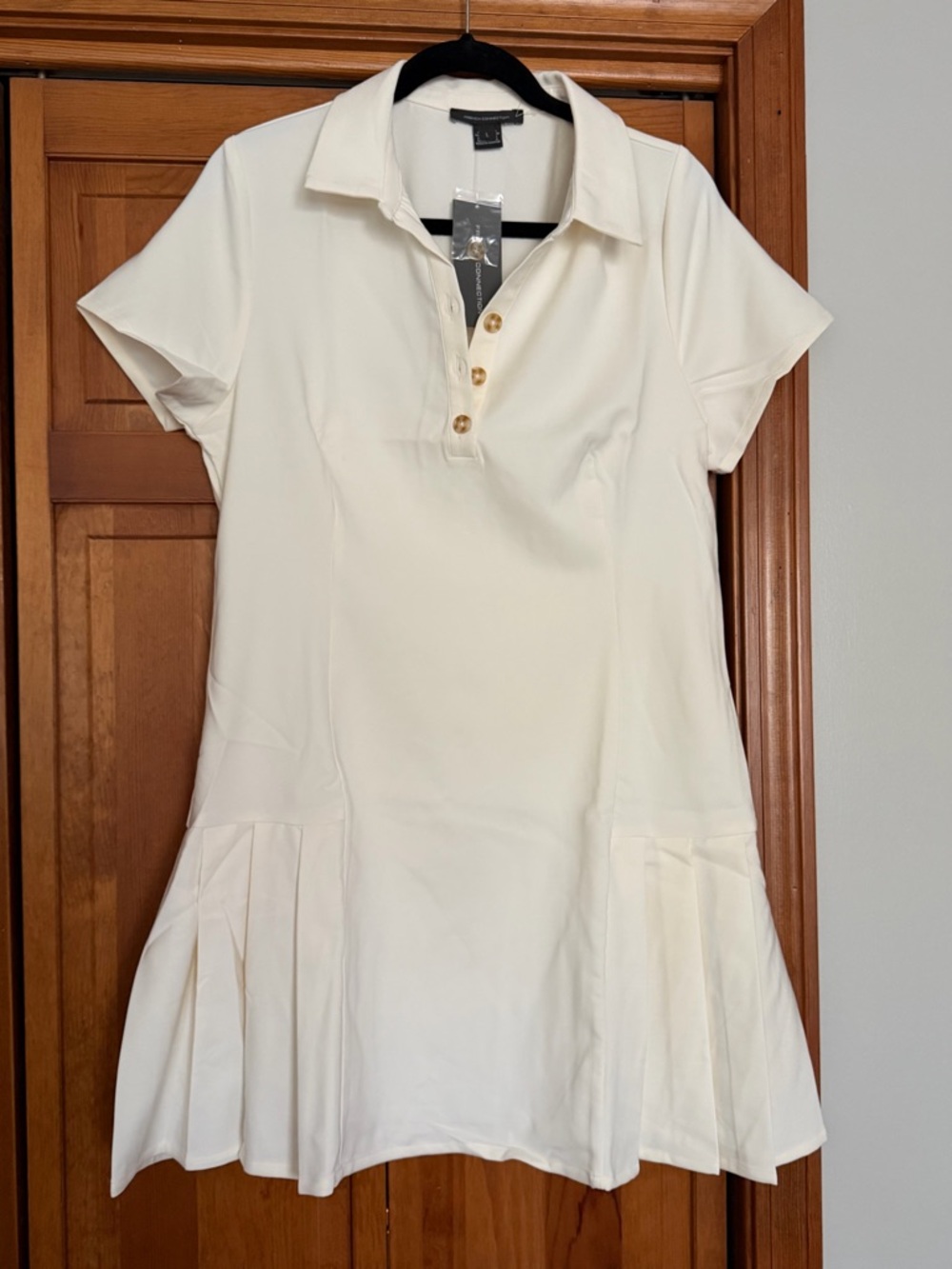 NWT - never worn - French Connection Cream Polo Mini Dress with Pleated Hem